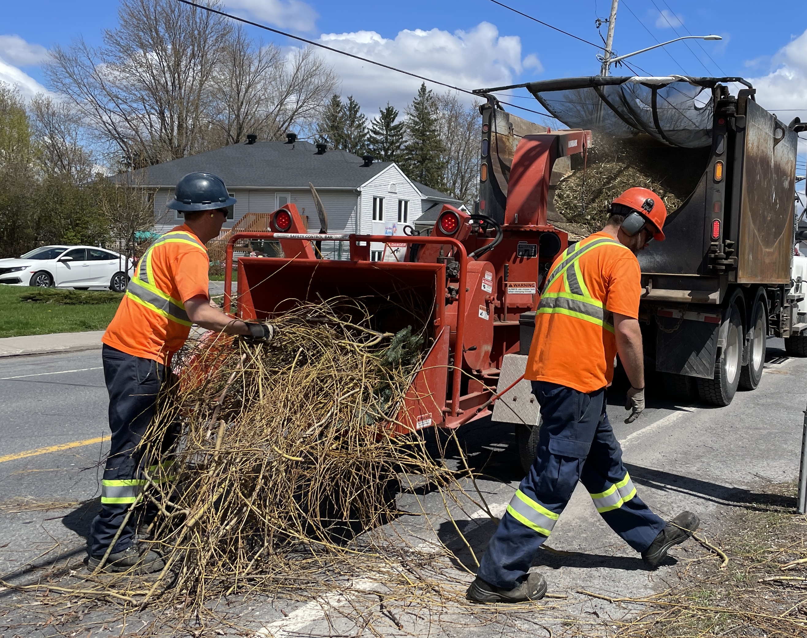 Township staff collecting branches