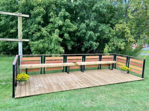 Bench seating area with flower pots