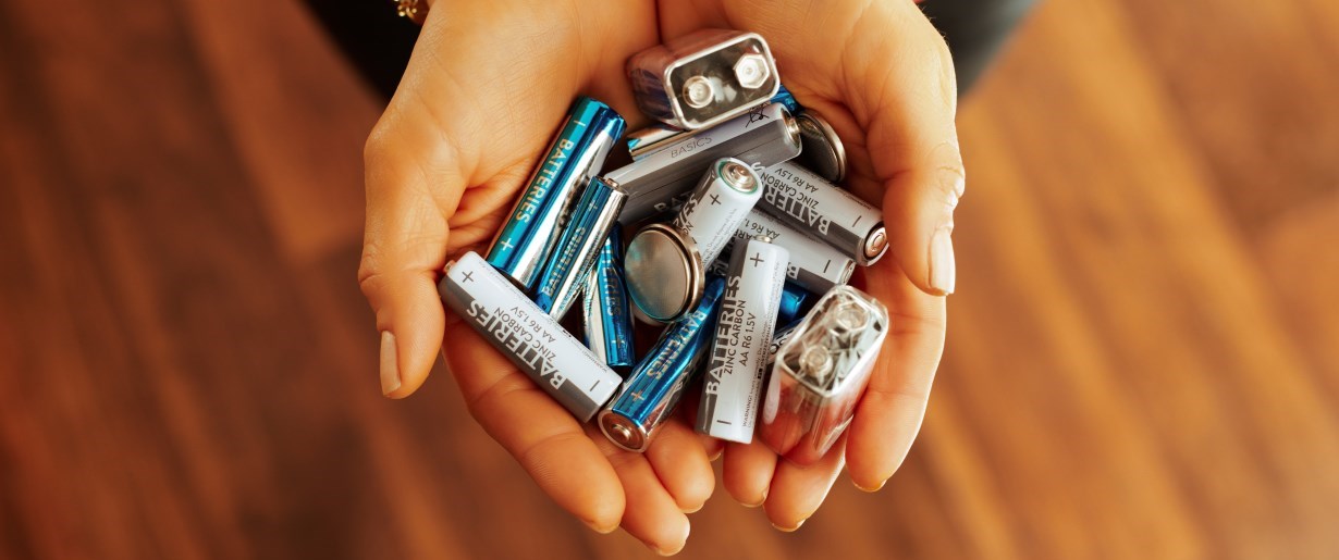 batteries in a hand