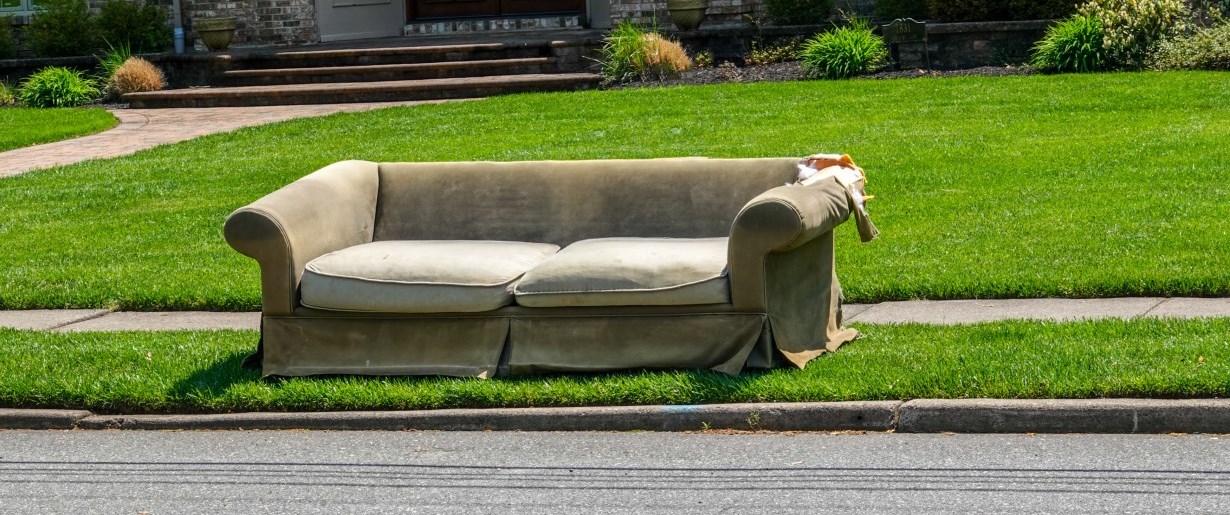 Sofa at the end of a driveway